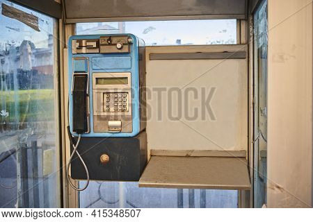 Telephone From An Old Telephone Booth Installed In A City