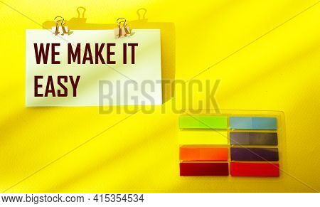 We Make It Easy The Text Is Written On A Sticker And A Yellow Background