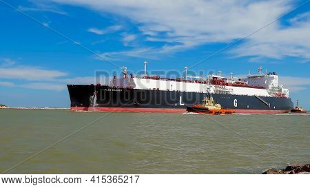 Port Aransas, Tx - 22 Feb 2020: The Flex Ranger, A Blue Lng Tanker Ship, On The Shipping Channel Bet