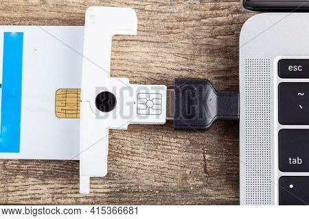 A Personal Identity Verification (piv) Card Is Used To Login To A Workspace Computer. The Card Conta