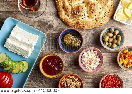 Healthy Turkish Breakfast, With Sliced Tomato, Cucumber, And White Feta Cheese, Small Bowls Of Straw