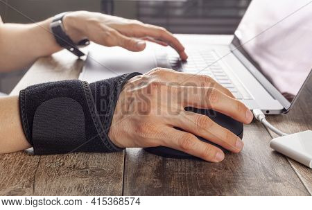 Chronic Trauma To The Wrist Joint  In People Using Computer Mouse May Lead To Disorders That Cause I