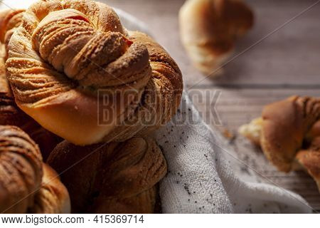 Traditional Turkish Hashasli Corek. A Croissant Like Pastry Roll With Poppy Seed Paste Inside. A Clo