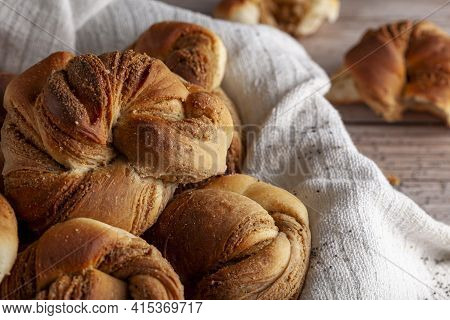 Traditional Turkish Hashasli Corek. A Croissant Like Pastry Roll With Poppy Seed Paste Inside. A Clo