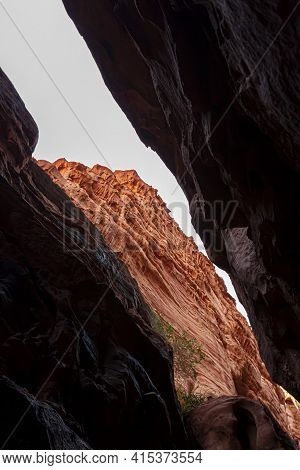 Image Of The Khazali Canyon, A Narrow Passage Between Gigantic Red Sandstone Rocks In Wadi Rum, Jord