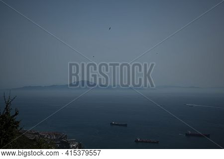 Aerial View Of The Strait Of Gibraltar  Taken On The Rock Of Gibraltar. Image Shows Hazy Horizon Wit