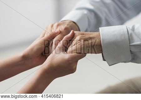 Nurse Holding Senior Man S Hands Sympathy . High Quality And Resolution Beautiful Photo Concept