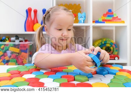 Speech Therapy, The Development Of Fine Motor Skills. Girl Playing Puzzle, Happy Child