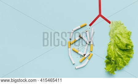 Lungs Shape With Salad Cigarettes Copy Space . High Quality And Resolution Beautiful Photo Concept
