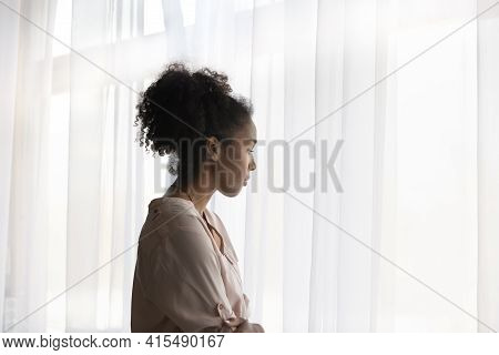 Pensive African American Woman Look In Distance Thinking