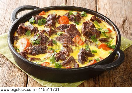 Montenegro Dish Balsica Tava Veal With Vegetables Baked With Eggs, Sour Cream And Milk Close-up In A