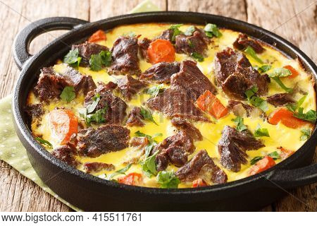 Adriatic Cuisine Balsica Tava Beef With Vegetables Baked In Egg Sour Cream Sauce Close-up In A Fryin
