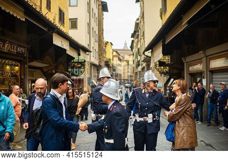 October 11, 2018.tuscany.italy.florence: Police And Tourists On The Ponte Vecchio Bridge