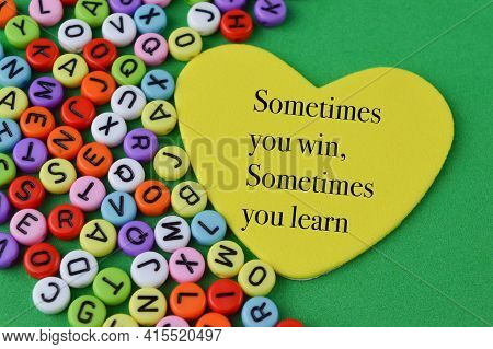 Alphabet Beads And Love Shape With Text Sometimes You Win, Sometimes You Learn