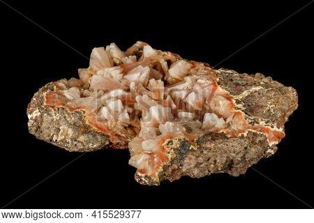 Macro Of A Stone Stilbite Mineral On A Black Background Close Up