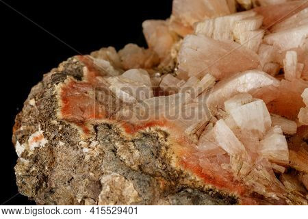 Macro Of A Stone Stilbite Mineral On A Black Background