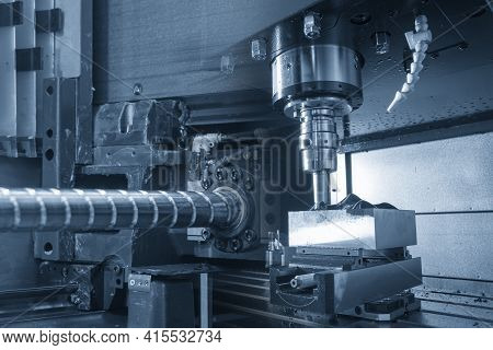 Abstract Scene  Cnc Milling Machine And The Ball Screw. The Hi-precision Of Cnc Machining Center Con