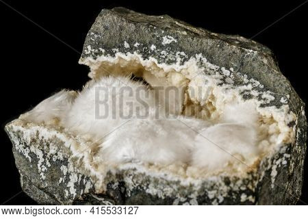 Macro Stone Stilbite Mineral On White Black Close Up