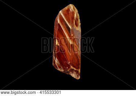 Macro Of A Mineral Quartz Stone With Lepidokrokit On A Black Background