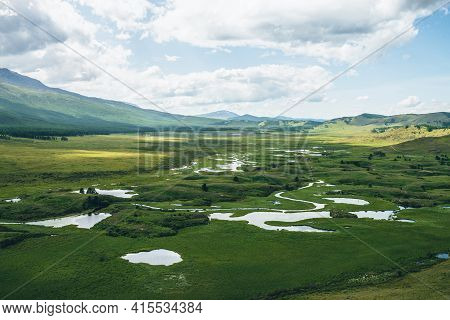 Beautiful Green Mountain Scenery With Lake System On Tableland Among Forest Hills. Scenic Landscape 