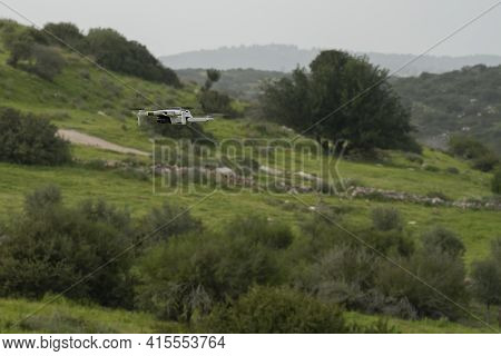 A Drone With A Camera Flying Over A Fallow Field In The Adullam Region, Israel.