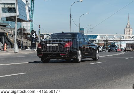 Moscow , Russia - March 2021: Mercedes-benz S500 On The City Road. Back View Of Black Shiny Car On T