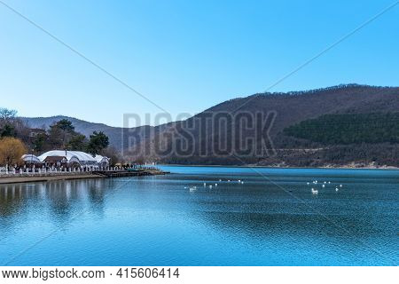 Beautiful View Of The Shore Of Lake Abrau In Early Spring. Picturesque View Of Embankment Of Lake Ab