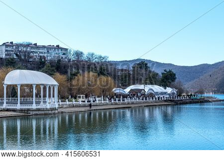Beautiful View Of The Shore Of Lake Abrau In Early Spring. Picturesque View Of Embankment Of Lake Ab