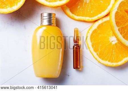 Vitamin C, Natural Anti Aging Cosmetics Cream Bottle And Serum Ampula