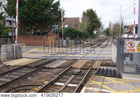 21 March 2021 - Datchet Uk: View Of Railway Lines Across Level Crossing