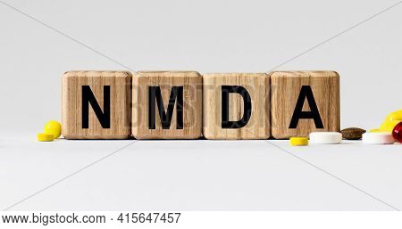Cubes With The Word Nmda On Them. Care Concept.