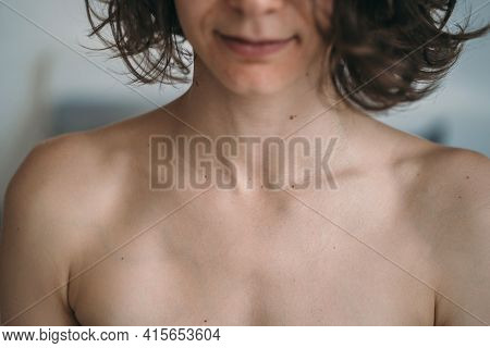 Close Up Of Girls Collarbone. The Girl Shows Her Beautiful Collarbones