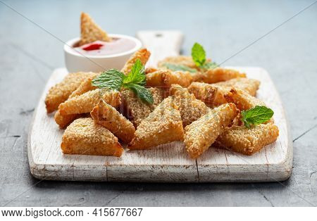 Asian Traditional Prawn Toast With Sesame Seeds And Sweet Chilli Sauce On Wooden White Board