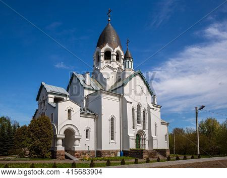 Beautiful Russian Church With Dark Helmet-shaped Domes. Church Of St. Alexis, Taitsy Town, Leningrad