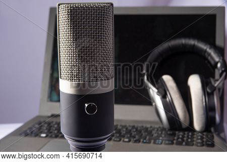 Home Work, Professional Condenser Microphone, Computer And Headset On Light Background, Selective Fo