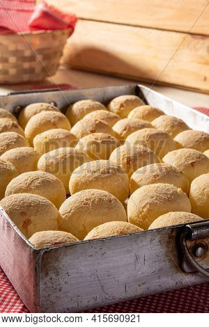 Cheese Bread, Shape Filled With Cheese Bread That Has Just Come Out Of The Oven On A Checkered Table