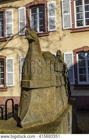Neumagen, Germany - February 20, 2021: Stone Statue Of  The Ship Of A Wine Merchant With Barrels In 