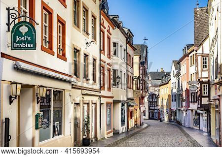 Bernkastel-kues, Germany - February 21, 2021: Half-timbered Houses At The Central Shopping Mile In B