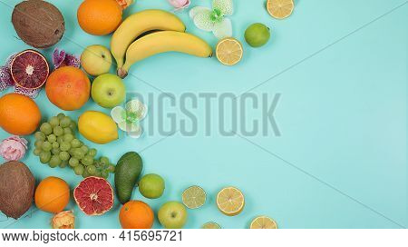 Detox Diet And Weight Loss Concept. Summer Tropical Fruits On Bright Table With Place For Text, Top 