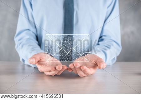 Businessman Hand Holding E-mail Icon, Contact Us By Newsletter Email And Protect Your Personal Infor