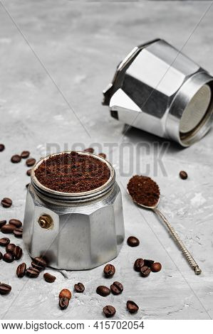 Moka Pot Filled With Ground Coffee, Close-up, Selective Focus, Gray Minimalistic Neutral Background.