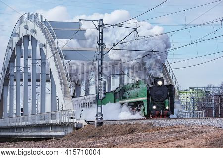 Steam Retro Train Departs From The Station.