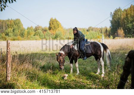 On A Sunny Day, The Girl Takes A Ride On Horseback Through The Expanses Of Her Estate