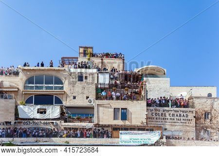 JERUSALEM, ISRAEL - NOVEMBER 16, 2011: The square in front of Western Wall. The symbol of faith and hope fo Jews. The Jewish holiday. Thousands of Jews pray at the Old City of Jerusalem. 