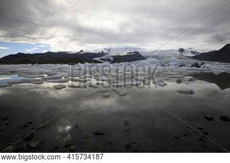 Fjallsarlon / Iceland - August 18, 2017: Fjallsarlon Glacier Lagoon View With Ice Formations, Icelan