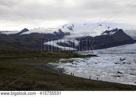 Fjallsarlon / Iceland - August 18, 2017: Fjallsarlon Glacier Lagoon View With Ice Formations, Icelan