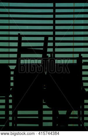 Chair Silhouette Inside A Restaurant
