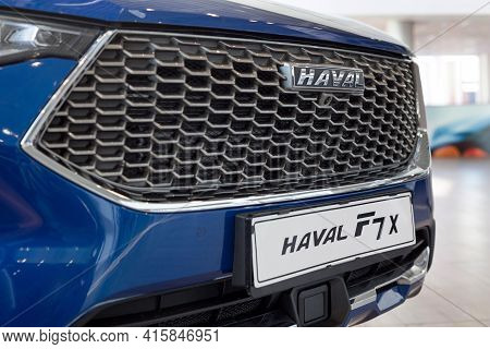 Russia, Izhevsk - February 17, 2021: Haval Logo On A Bumper Of New Car F7x At Dealership Showroom. C
