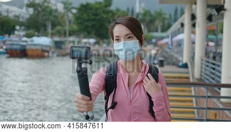 Hong Kong 22 September 2020: Woman take a video on Gopro camera