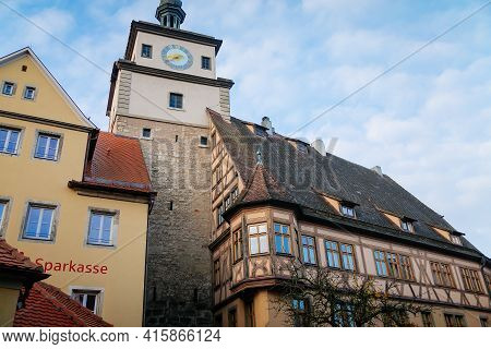 Medieval Gothic Clock White Tower Or Weisser Turm And Half-timbered House On Georgengasse Street, Su